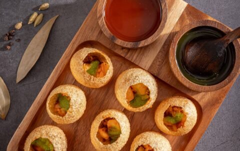Pani puri (golgappa) with spiced water and chutneys at Tandoori Smoke, Indian street food in Khlong San Bangkok