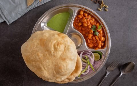 Chole bhature, spicy chickpea curry with fluffy fried bhatura at Tandoori Smoke Indian restaurant Bangkok