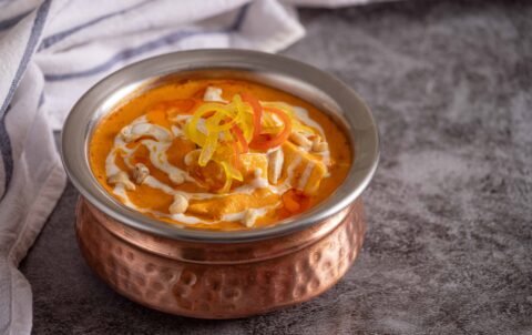 Paneer butter masala in creamy tomato gravy at Tandoori Smoke, vegetarian Indian food in Bangkok